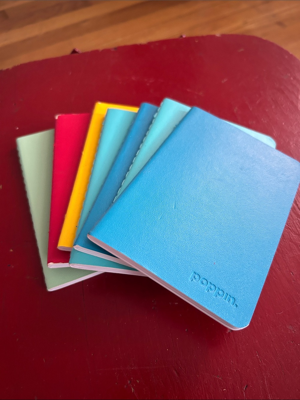 7 poppin mini lined notebooks (set from ContainerStore) never used